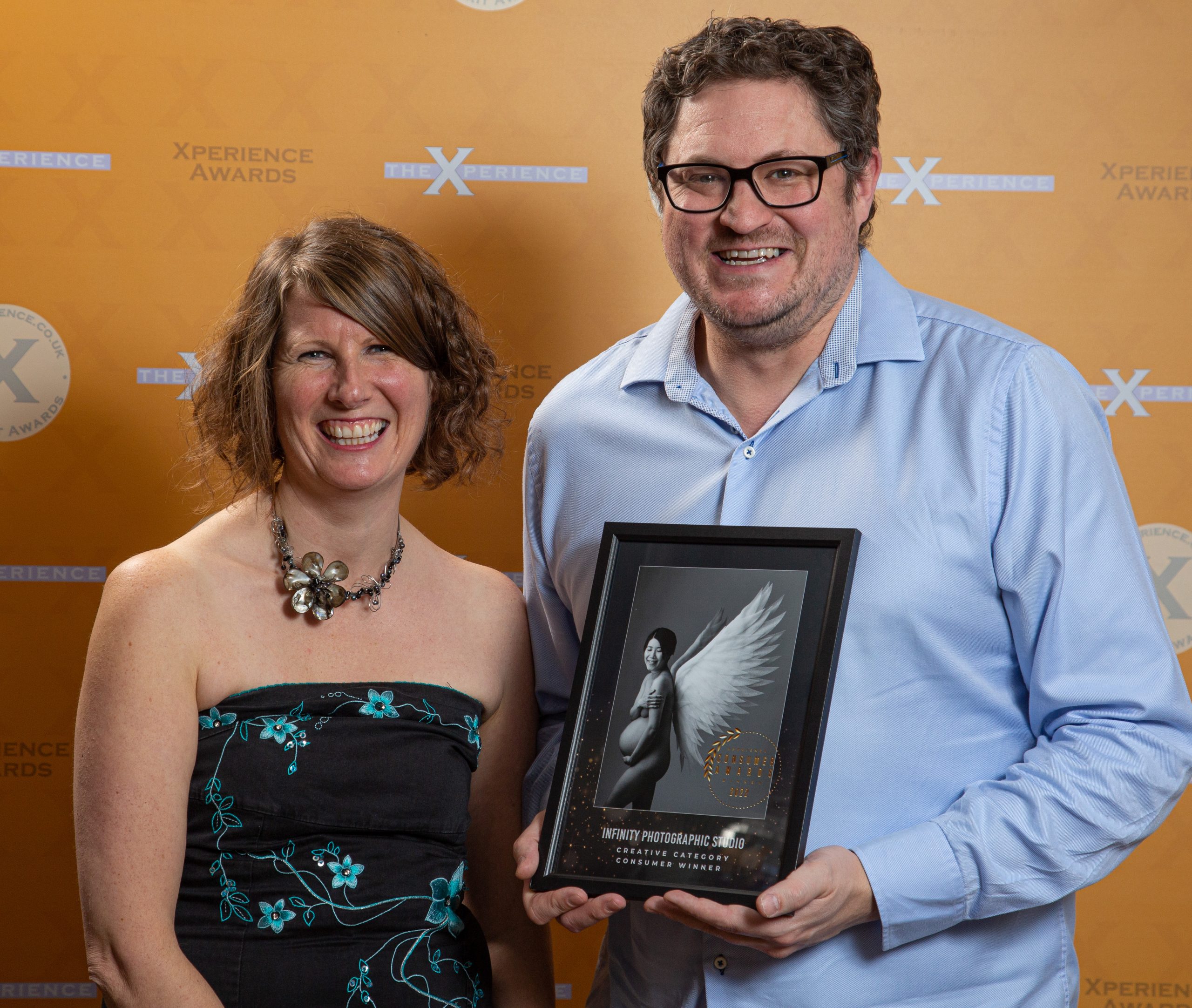 Photographer Alan receiving photography award from the Xperience group 2022