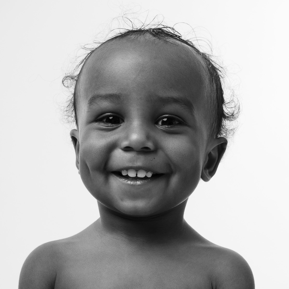 Grinning toddler, black and white